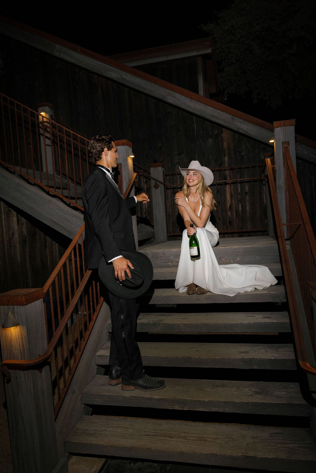 Champagne on the lit stairs after dark